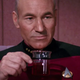 Truly, the face of a man having to drink something gross to get through a performative nicety.
